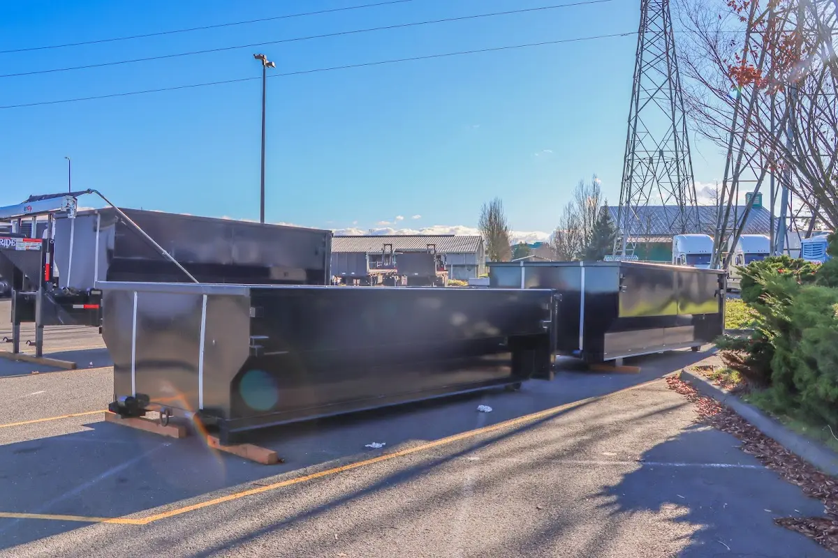 Roll-off dumpster ready for waste disposal at job site for Yard Waste Dumpster Rental in Wahoo